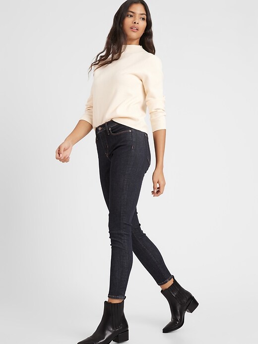 Image number 1 showing, Petite Mid-Rise Skinny Soft Sculpt Jean