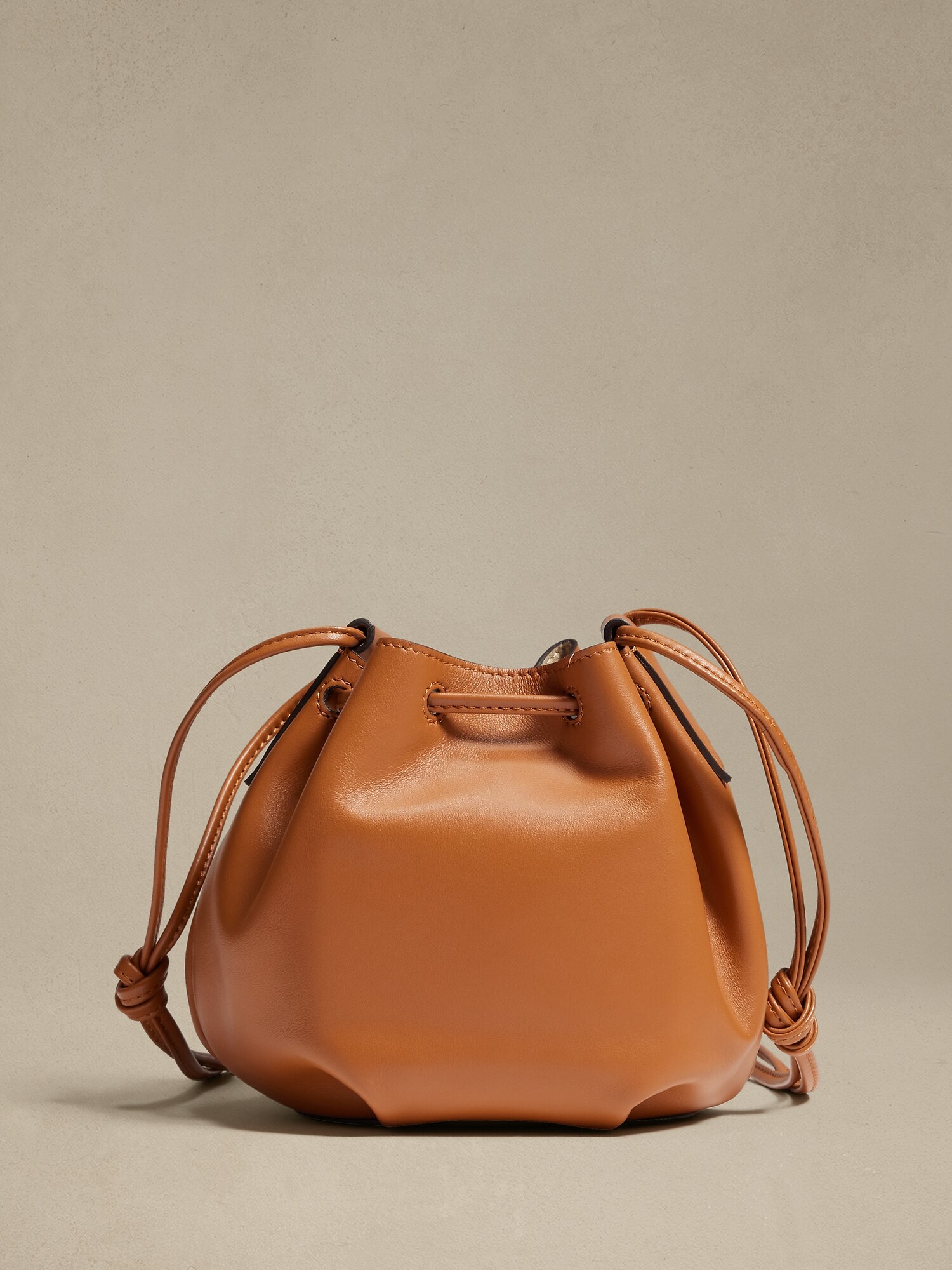 Brown leather bucket outlet purse