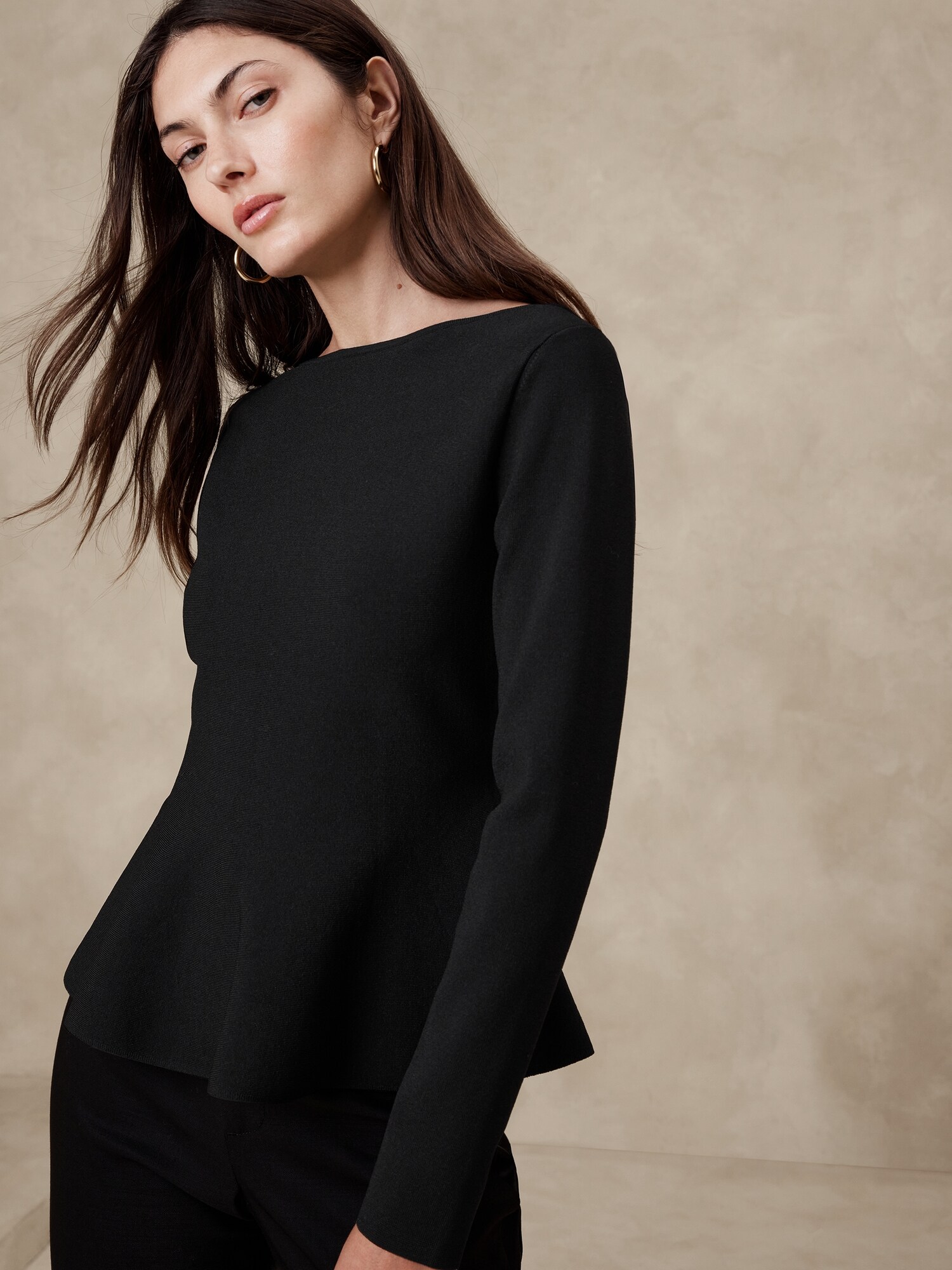 Peplum sweater clearance top