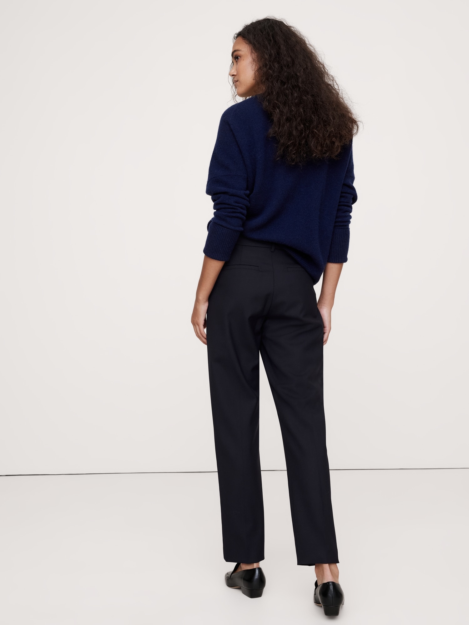 Pantalon fuselé à taille haute en laine italienne