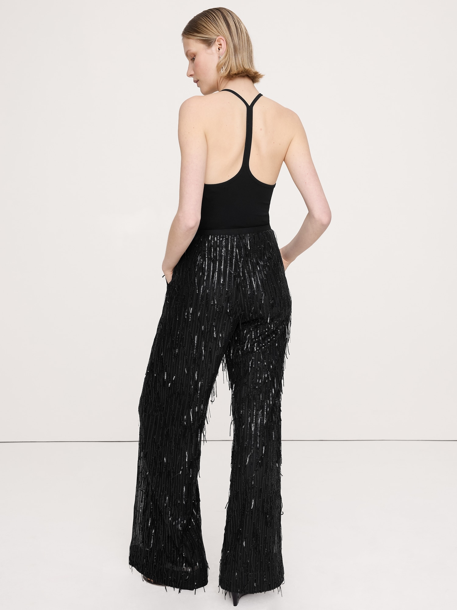 L'image numéro 2 présente Pantalon à paillettes et franges à jambe large à taille haute