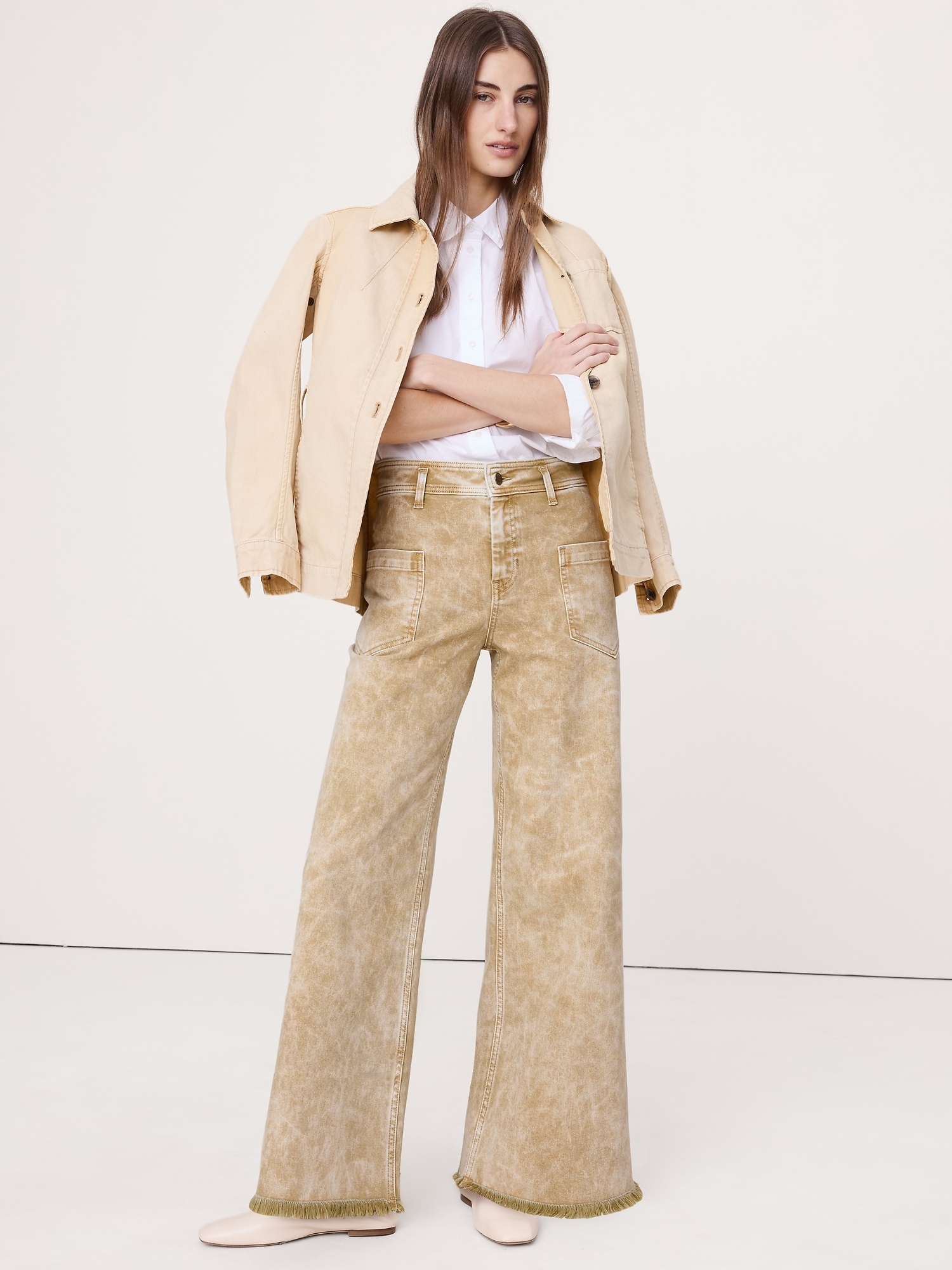 JEAN À TAILLE HAUTE, JAMBE LARGE ET OURLET BRUT EN TISSU EFFET MARBRÉ