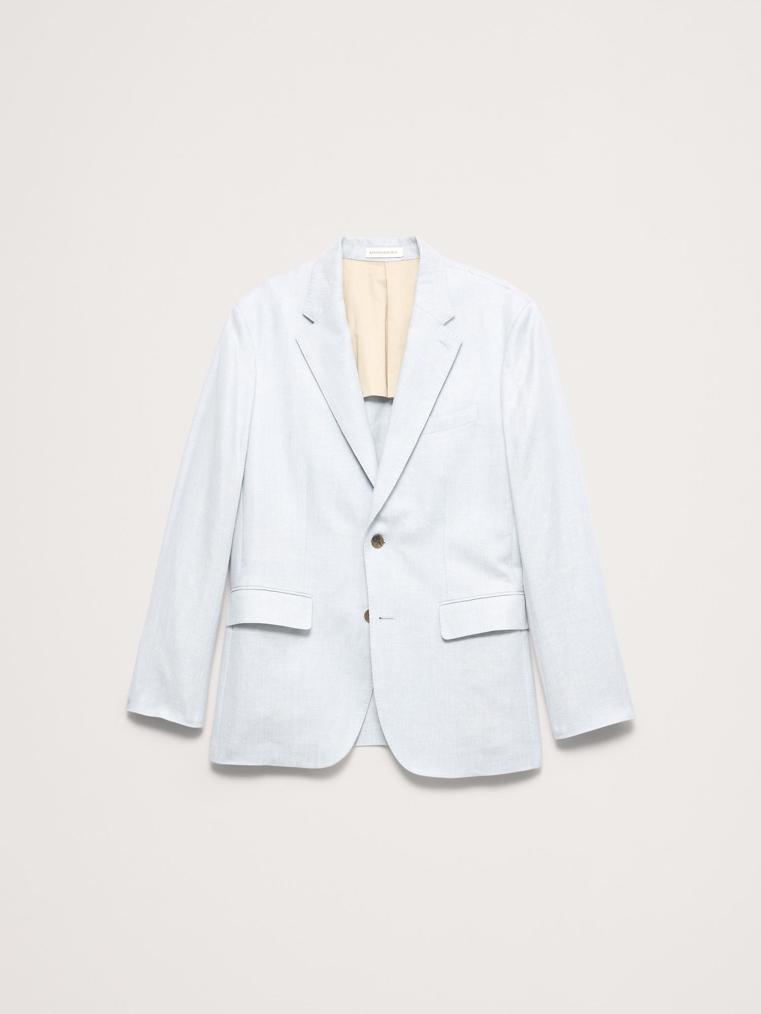 L'image numéro 5 présente Veste de complet en lin et laine mérinos à motif de chevrons