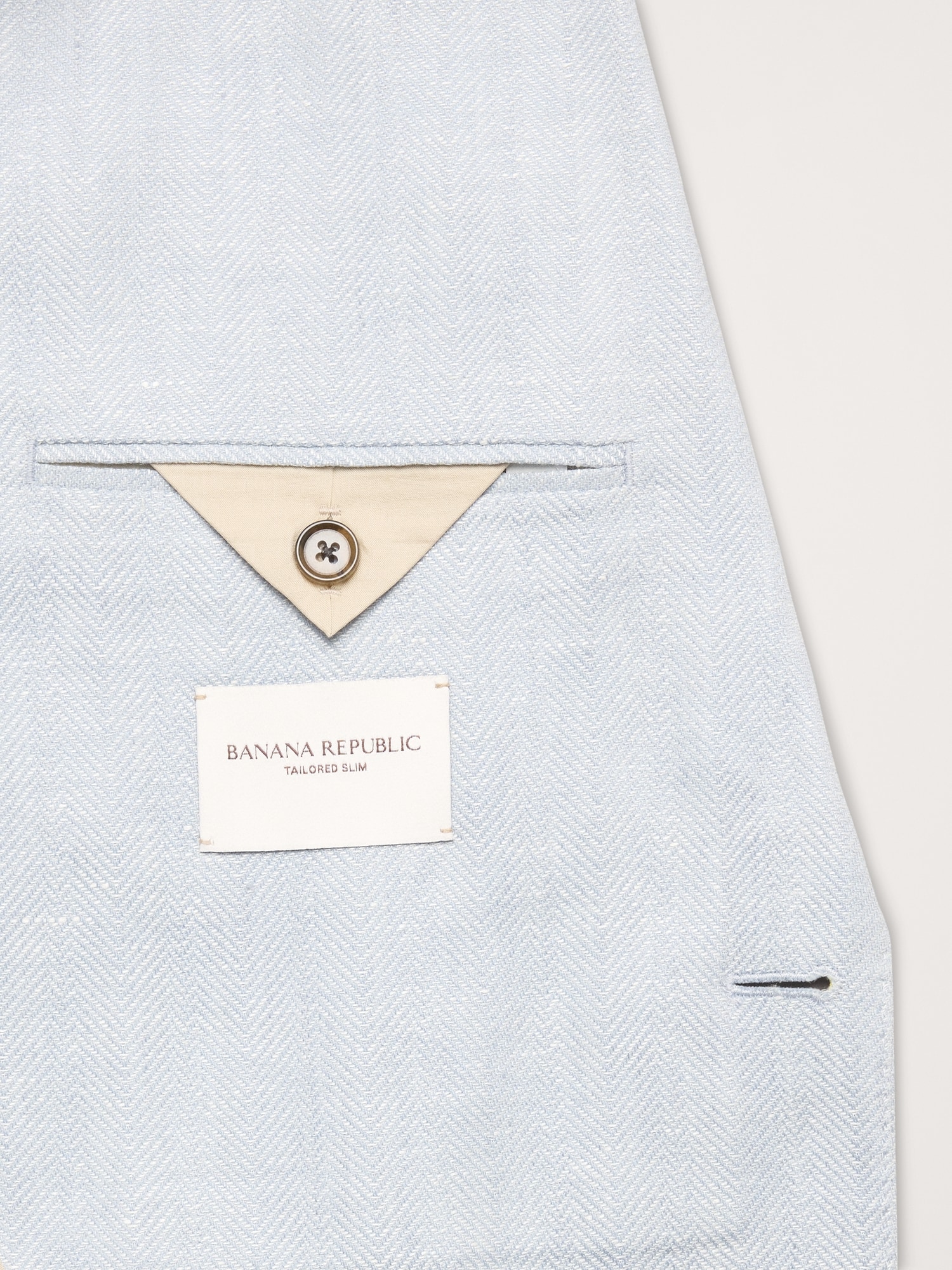 L'image numéro 7 présente Veste de complet en lin et laine mérinos à motif de chevrons