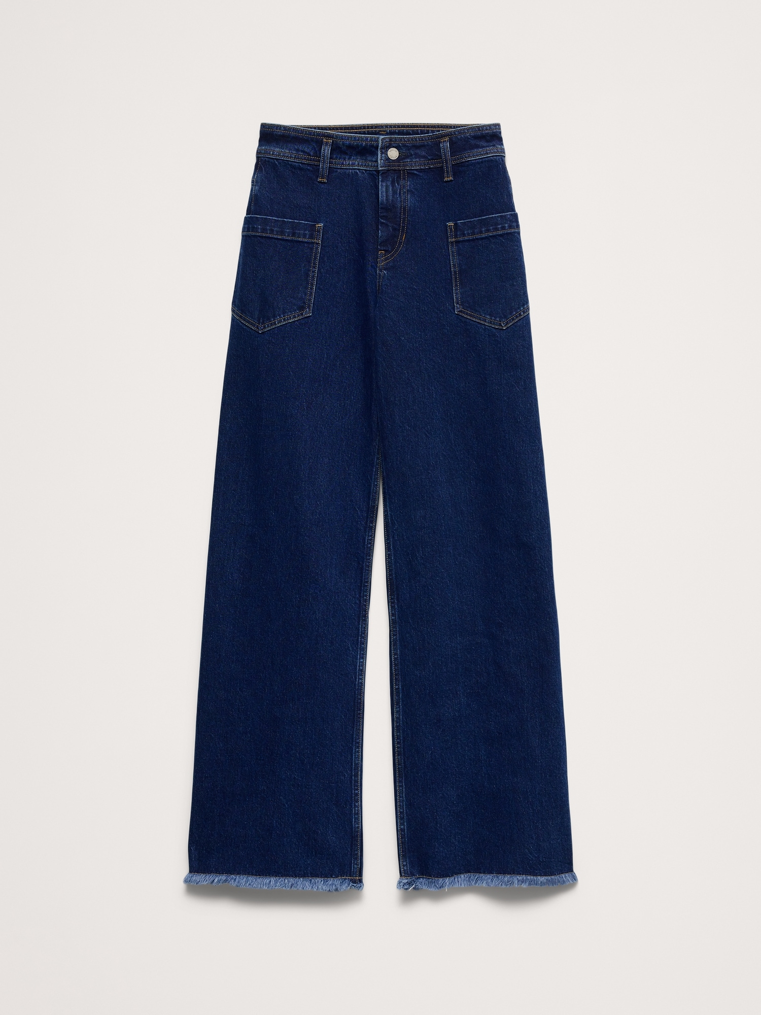 L'image numéro 4 présente Jean à taille mi-basse, jambe large et ourlet brut en tissu effet marbré