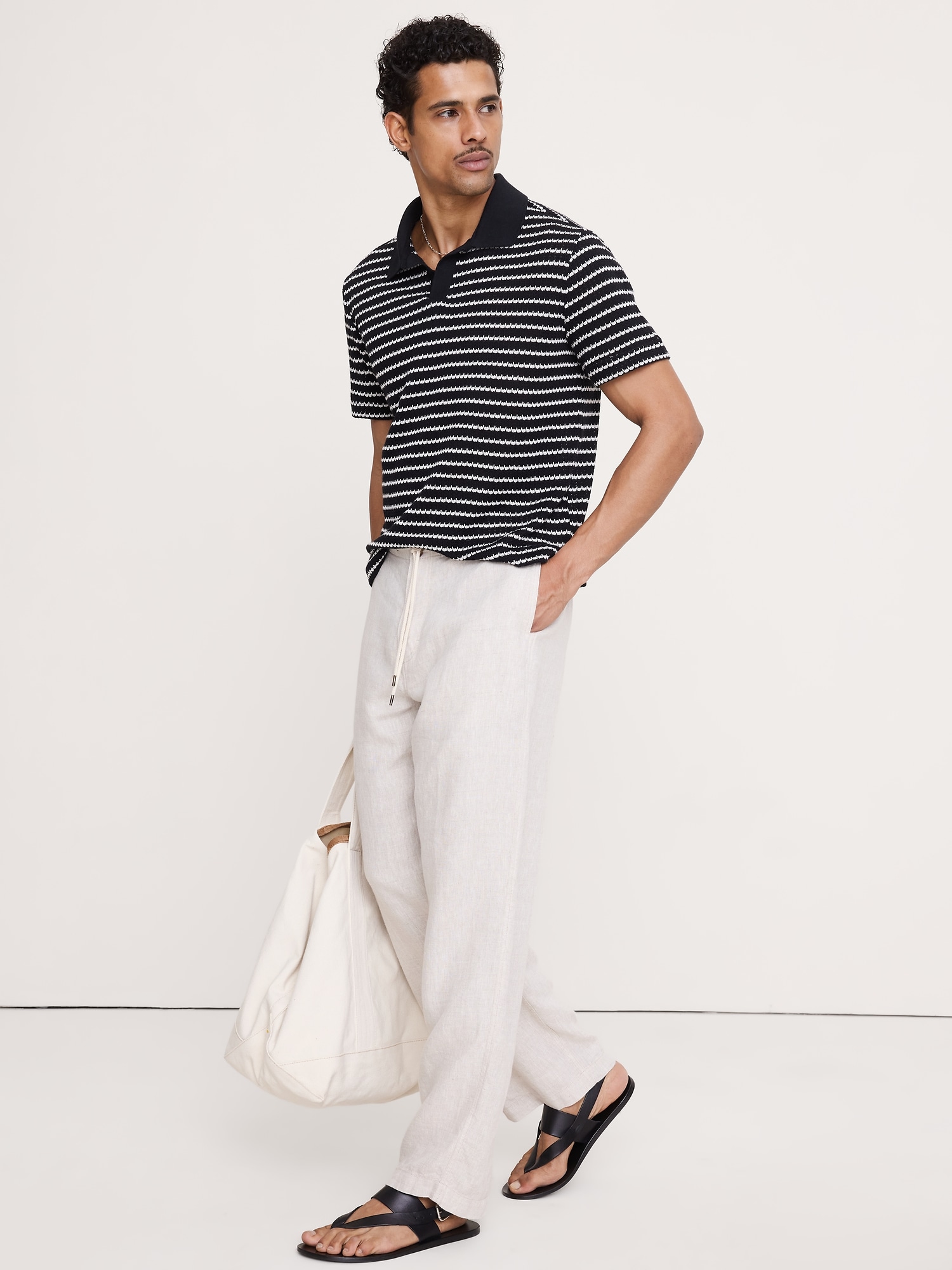 L'image numéro 1 présente Haut à rayures à col polo tricoteuse