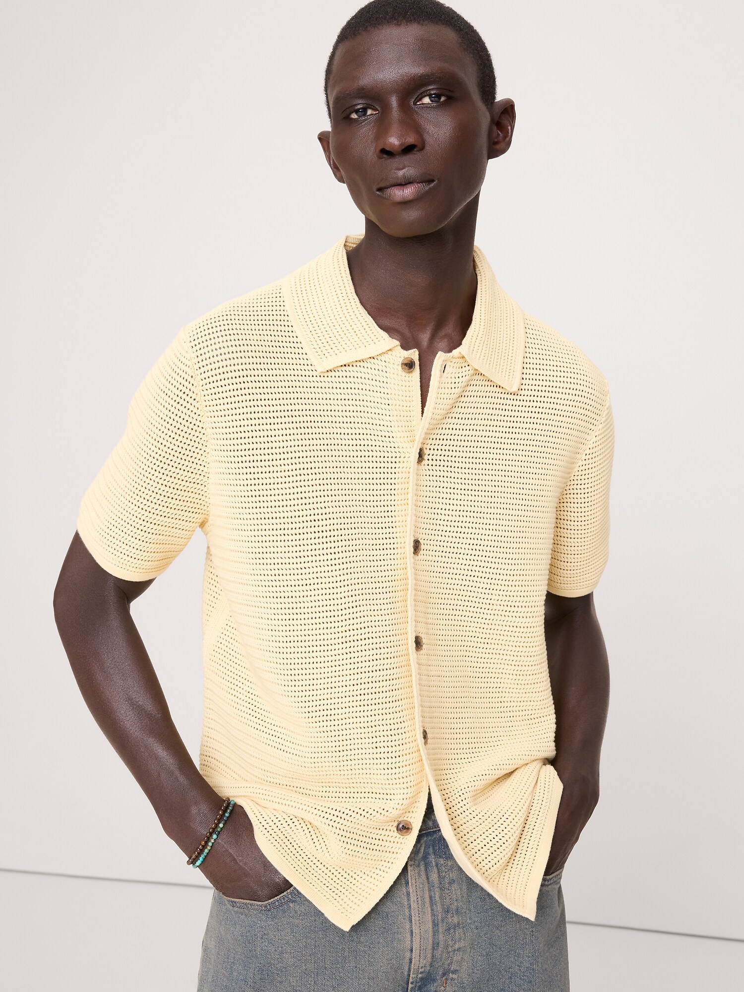 L'image numéro 1 présente Cardigan polo en coton à mailles