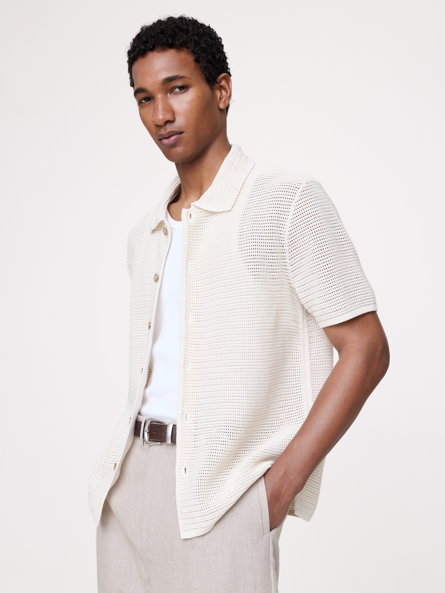 L'image numéro 1 présente Cardigan polo en coton à mailles