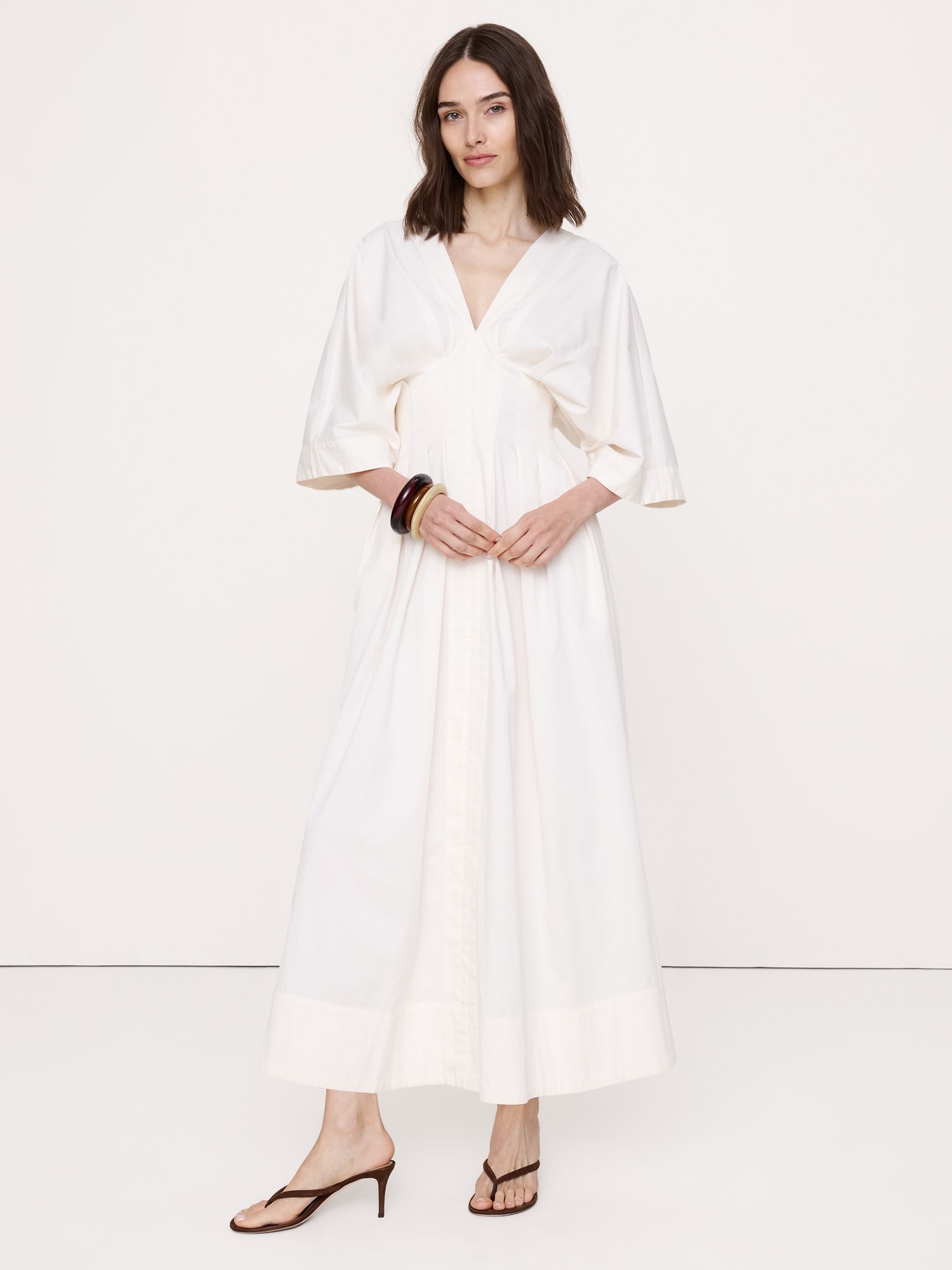 L'image numéro 1 présente Robe longue à plis en coton extensible
