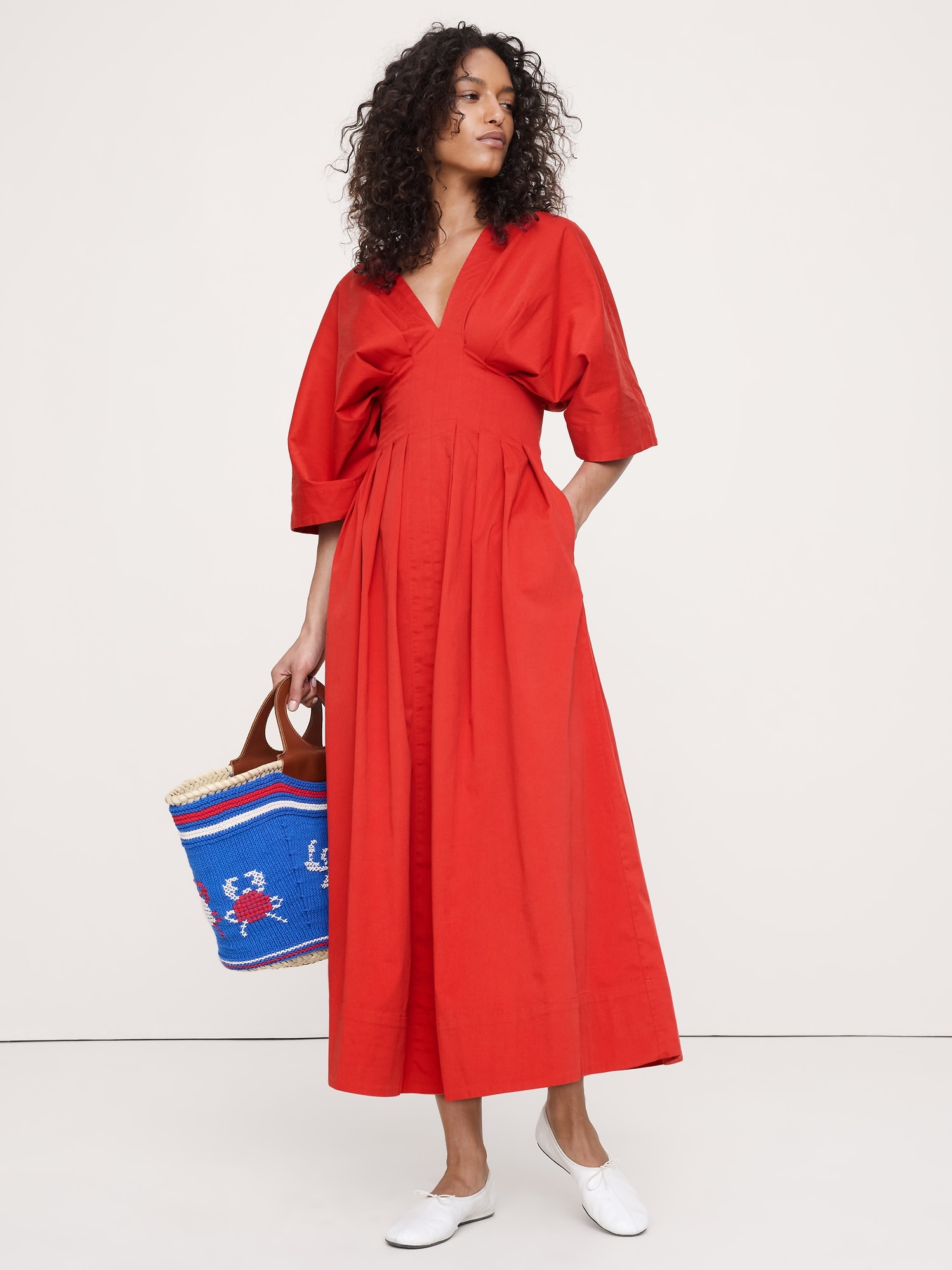 L'image numéro 1 présente Robe longue à plis en coton extensible