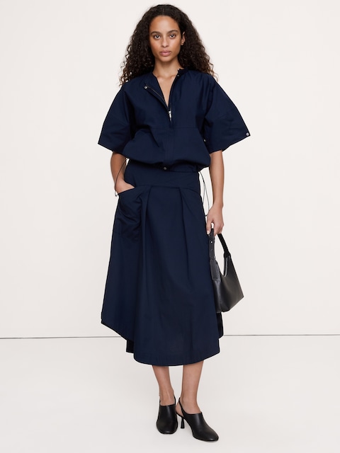 JUPE MI-LONGUE EN COTON EXTENSIBLE À TAILLE BASSE